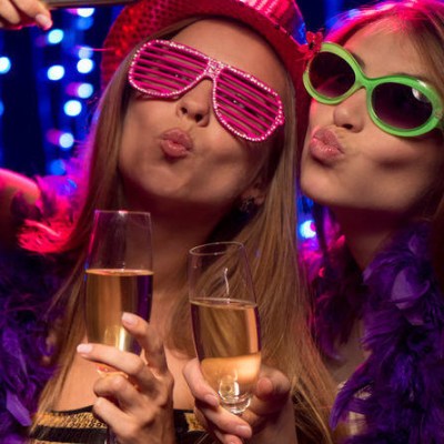 a person holding a wine glass