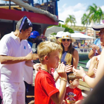 a group of people standing next to a person