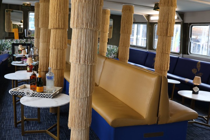a dining room table in front of a window