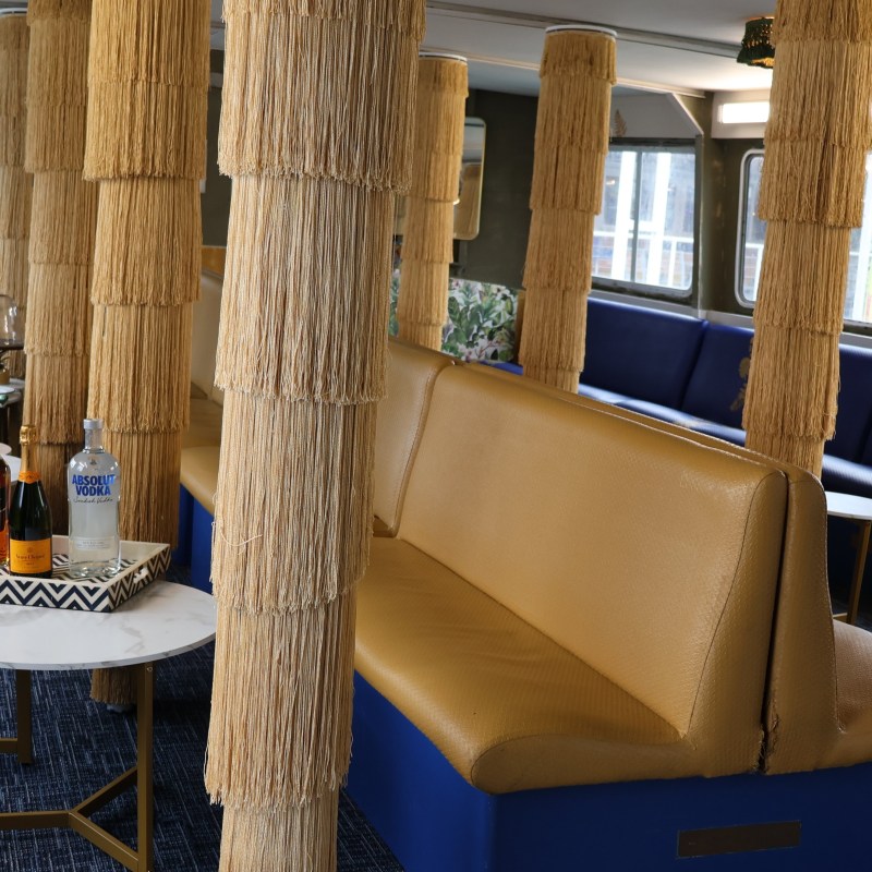 a dining room table in front of a window