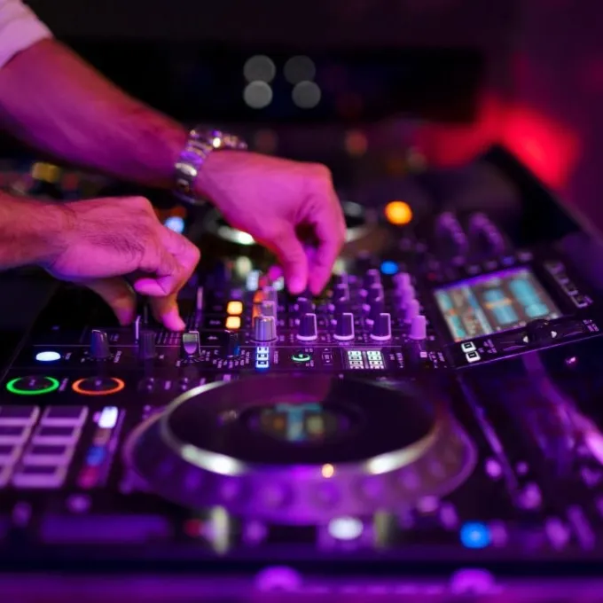 a person standing in front of a keyboard