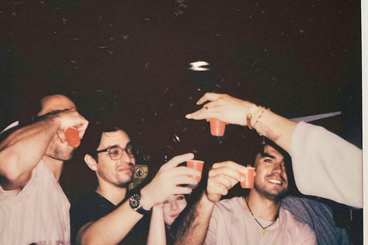 a group of people posing for the camera