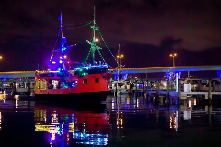 a boat docked at night