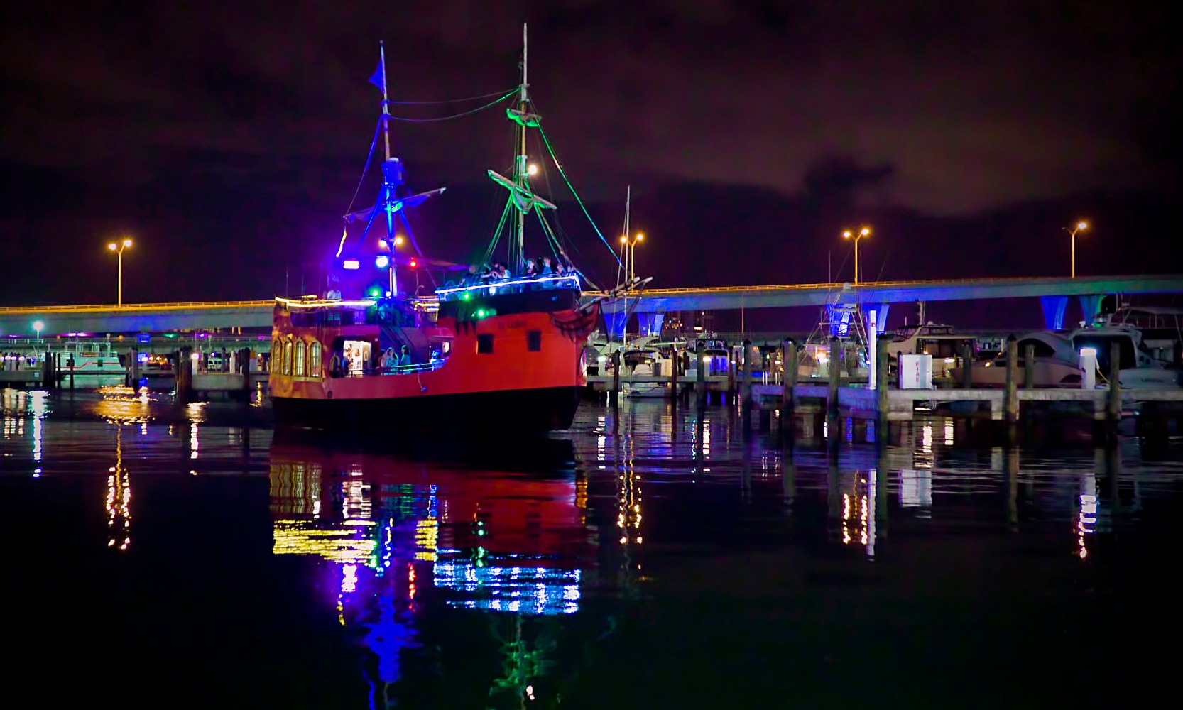 a boat that is lit up at night