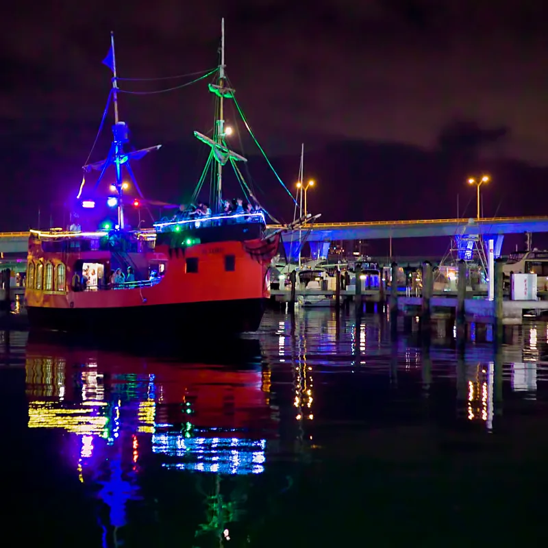 a boat that is lit up at night