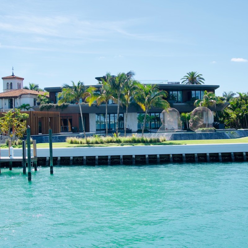a boat is docked next to a body of water