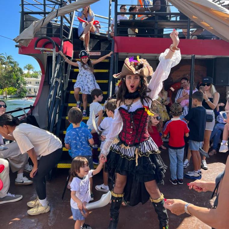 a group of people standing in front of a crowd