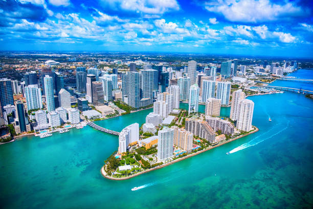 a large body of water with a city in the background
