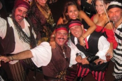 pirate costumes smiling at a party, miami